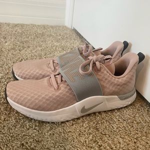 Nike Women’s pink and grey tennis shoes